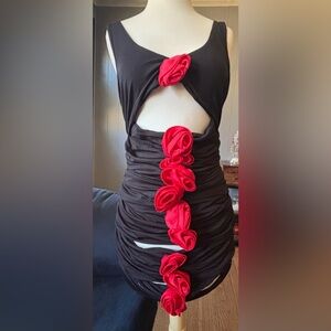 Elegant Black Dress with Red Floral Accents